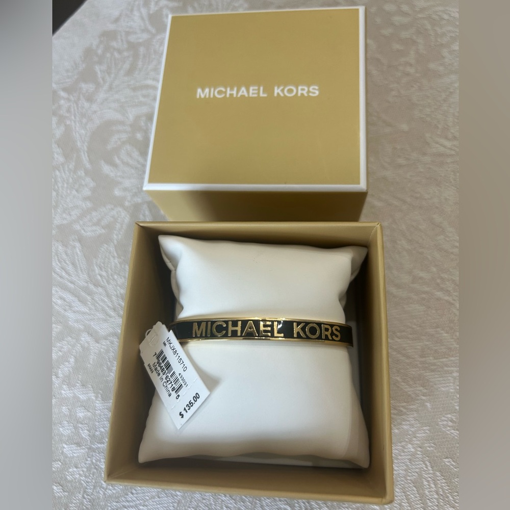 New with tags Michael Kors clamp bracelet.